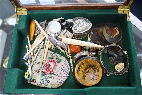 A large collection of bobbins, a purse, a portrait miniature, compass, enamel salt, pill box, caddy spoon and sundry curios